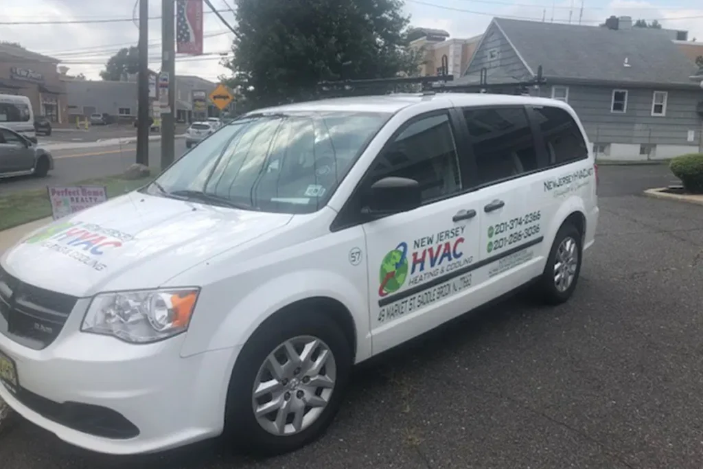 New Jersey HVAC service van parked, featuring company logo and contact details for heating and cooling solutions.